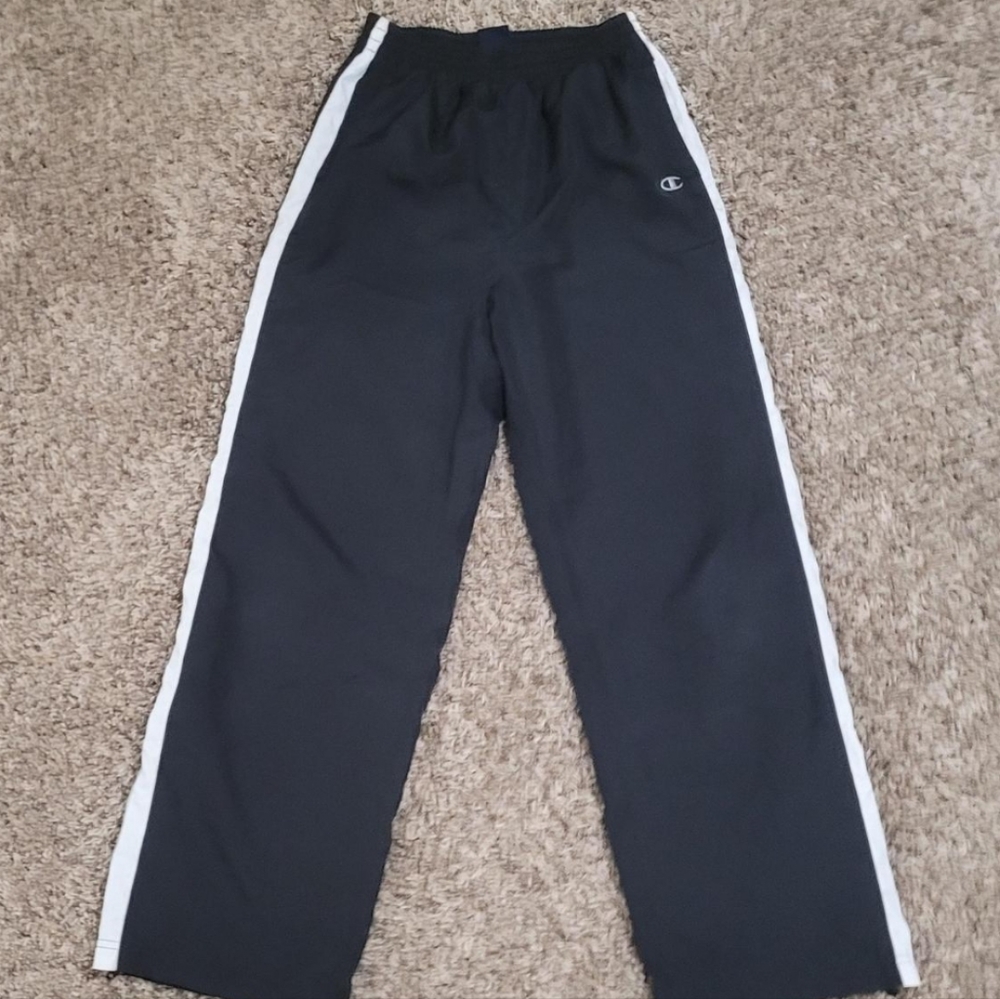 Black champion track pants size medium  fits up to large and fits small too